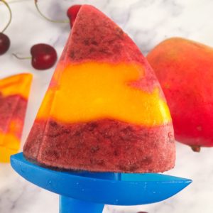 Sailboat popsicles with cherry and mango