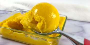 Scooped dairy-free mango ice cream
