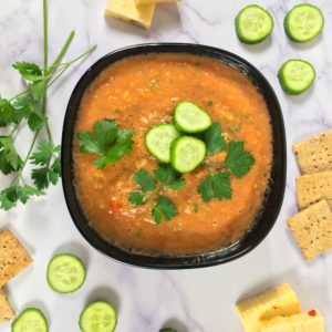 raw soup meal with crackers cheese veggies