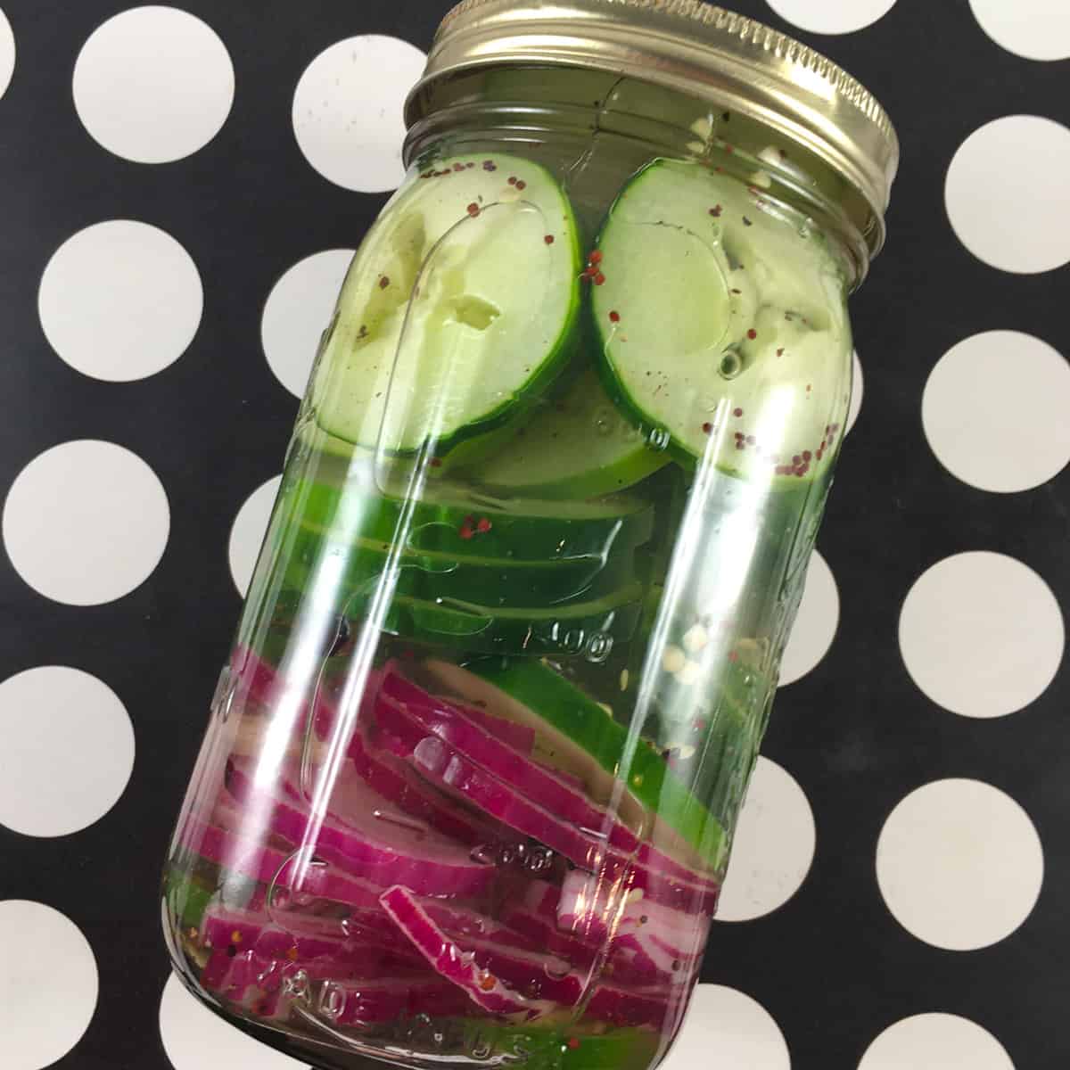 cucumbers and onions in jar