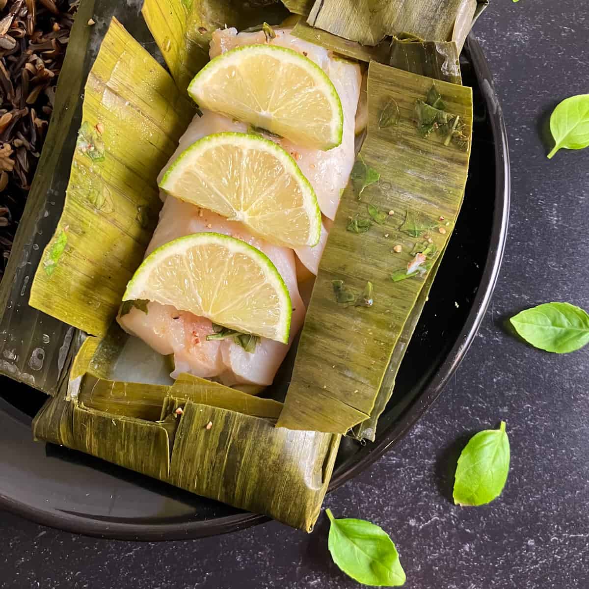 fish cooked in banana leaves